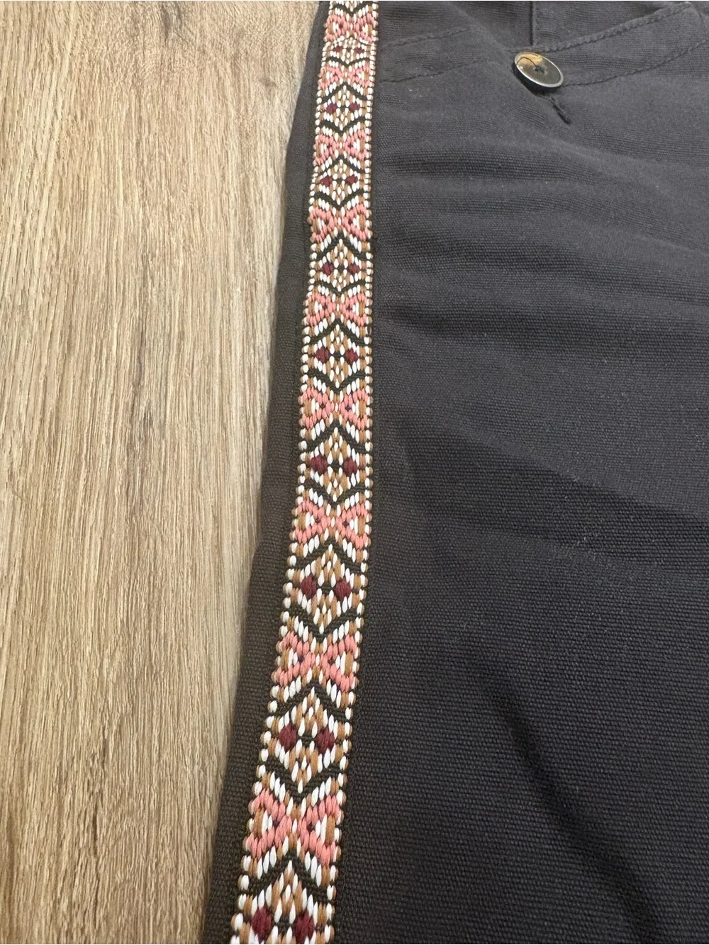 Anthropologie Black Tapered Pants with Pink Geometric Side Tape